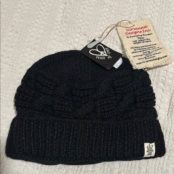 Nievanna Accessories - 🆕 Nirvanna Black Knit Beanie. OS. Brand New with Tags!!